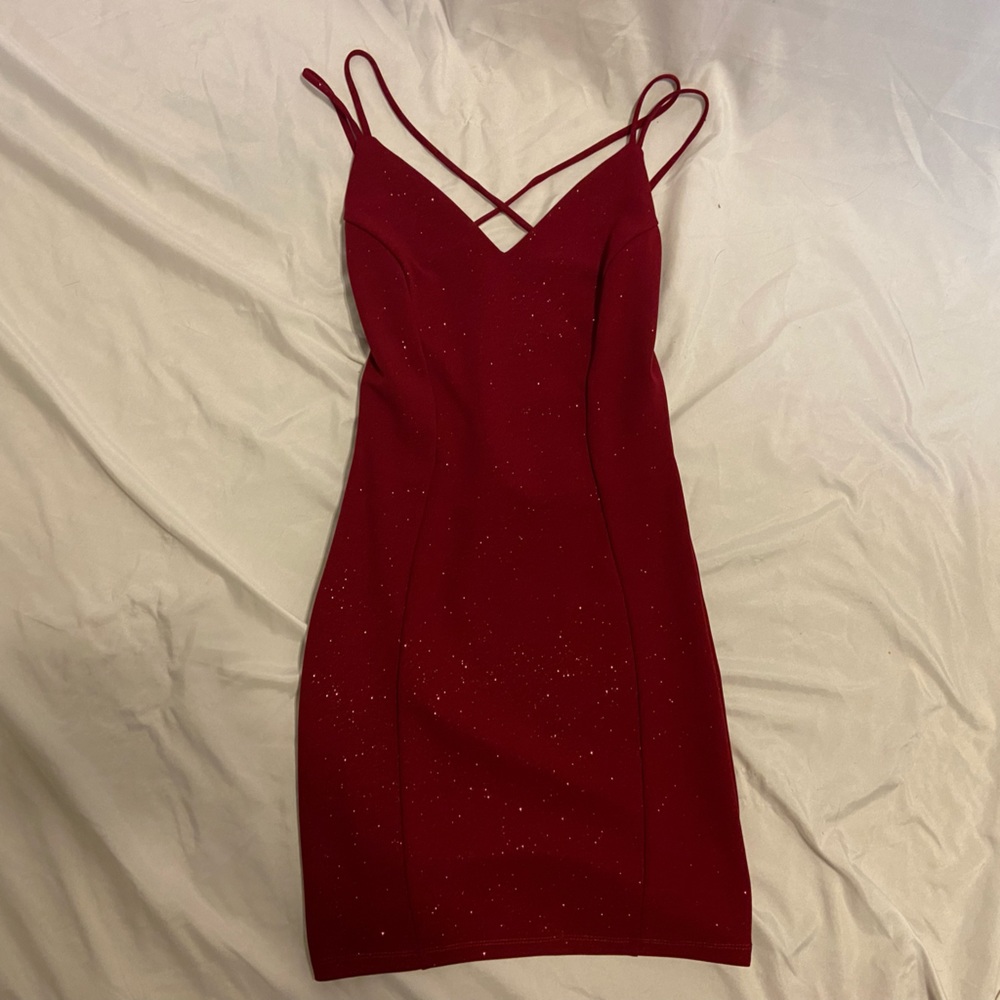 Red mini dress with spaghetti straps and open back